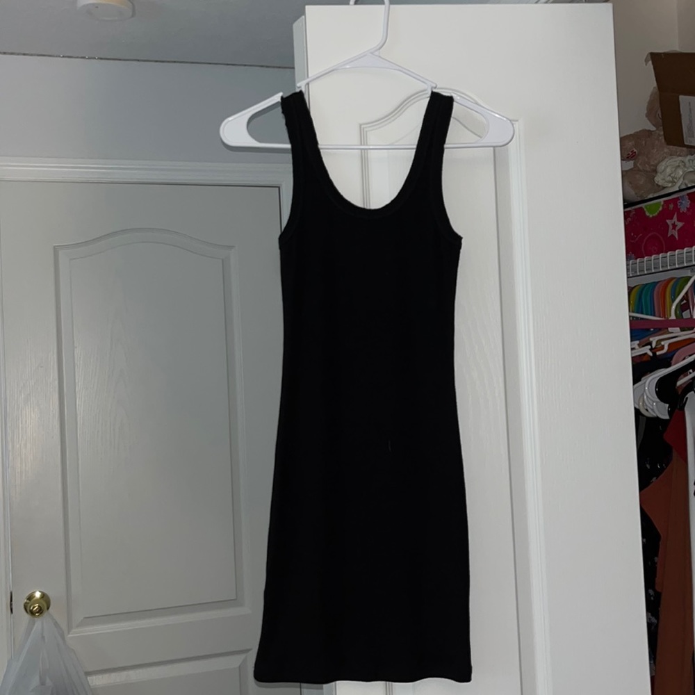 One of the boys black dress from fashion nova